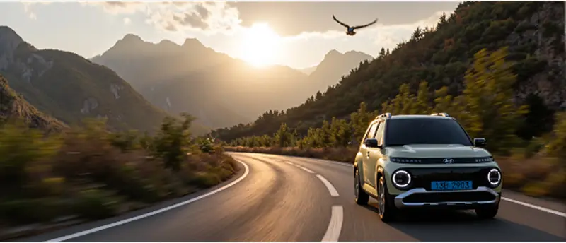 Hyundai SUV on a mountain road