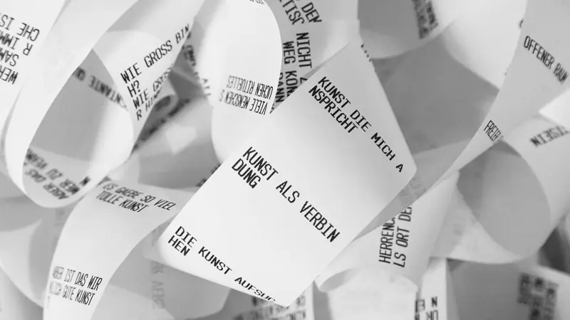 Curled receipts from the SMS printer